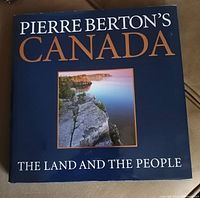 Cover photo of 'Pierre Berton's Canada: The Land and The People' hardcover book showing landscape photography on the cover.
