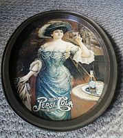Oval serving tray with Victorian Lady in teal dress holding Pepsi Cola glass and bottle on table, vintage style reproduction.