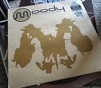 Vinyl record with Moody Recordings cover featuring beige and brown abstract map design