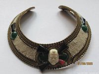 Front angled view of the M & J Hansen Egyptian Revival beaded choker necklace showing full shape and beadwork detail.