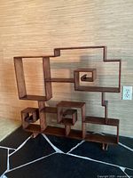 Front view showing overall geometric stepped design and condition