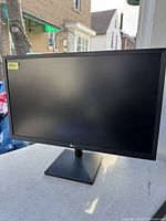 Front view of the LG 24 inch monitor showing the screen and stand.