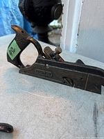 Side view of Stanley #78 Duplex Rabbet Plane showing metal body with Stanley logo and textured grip handle