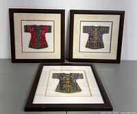 Three framed embroidered Asian silk kimono wall arts displayed together, showing colors, frames, and embroidery details.