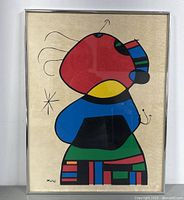 Full frontal view of framed lithograph showing abstract figure and overall condition