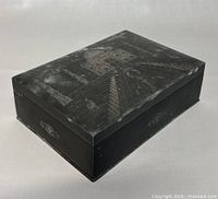 Closed rectangular pewter trinket box showing Taj Mahal etched design with silver inlay on the lid
