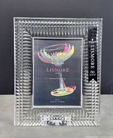 Front view of Waterford Crystal photo frame with Lismore label and 5x7 photo size indication.