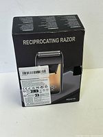 Front view of the reciprocating razor box labeled RQ-817A showing product name and certification labels.