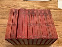 10 volumes of The World's 100 Best Short Stories, red hardcover set, spines numbered I to X