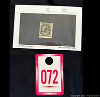Stamp mounted on a card showing Scott catalogue information