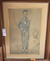 Full view of the framed Picasso print showing the standing male figure, aged distressed wood frame, and gold tone accent on canvas matte.