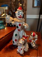 Front and angled view of Japanese vintage HB Japan ceramic clown and two monkeys trio, showing detailed paint and condition