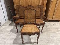 Front view of six chairs arranged in two rows