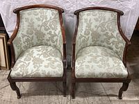 Front view of both chairs showing overall design and condition