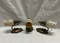 Front view of all three sconces on white backdrop