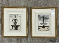 Both fountain etchings side by side in gilt frames on a concrete floor