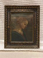 Full view of the framed painting showing subject and decorative frame