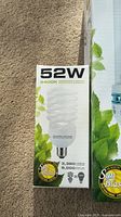 Photo of 52 watt Sunblaster CFL grow bulb box showing 6400K color temperature and 3,380 lumens brightness, spiral bulb shape.