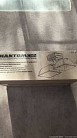 Box of Phantom Dual CMH grow light system showing product name and specifications.