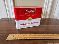 Front and top view of the Campbell's Recipe Card Collection tin, showing branding and overall shape.