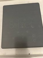 Closed black case with Slitzer logo embossed on top