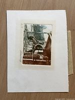 Full view of the antique etching mounted on white paper, showing the man sitting on a railing and the woman standing beside him.