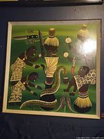 Full view of the signed African artwork painting depicting traditional scene with four figures and large snake.