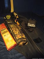 Recurve bow with camo quiver, arrows, target pack, digital scale and soft case
