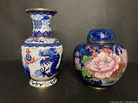 Both cloisonné vase and ginger jar side by side on black background