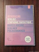 Front cover of DVD case labeled 'Introducing Berlioz: Symphonie Fantastique' with names Mariss Jansons and Berliner Philharmoniker.