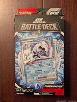 Front of sealed box showing Chien-Pao EX card from the deck and Battle Deck branding.