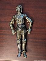Front view of 12 inch Star Wars C3PO talking figure showing detailed molded metallic gold droid features.