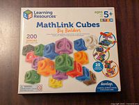 Front of Learning Resources MathLink Cubes Big Builders box, showing colorful cubes, age recommendation 5+, and 200 pieces in set.