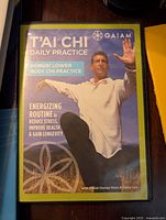 Front cover of Tai Chi Daily Practice DVD showing instructor David-Dorian Ross in a Tai Chi stance outdoors, highlighting the bonus lower body practice and benefits of the routine.