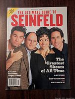 Front cover of The Ultimate Guide To Seinfeld magazine showing four main cast members and magazine title.