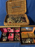 Open wicker basket containing tangled necklaces and costume jewelry pieces in various colors and materials