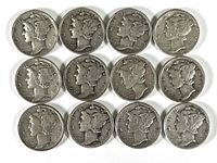 Obverse side showing Liberty profile on all 12 Mercury dimes with visible dates and wear.