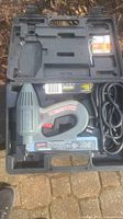 Arrow Nail Master 2 electric brad nailer and carrying case opened showing the nailer, power cord, and accessories inside