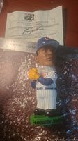 Photo showing the Fergie Jenkins bobblehead and accompanying Certificate of Authenticity.