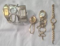 Overview of all six wristwatches showing varying band styles and dial shapes in gold and silver tones.