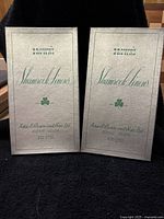Two vintage textured boxes labeled "Brown's Shamrock Linens" from John S Brown and Sons Ltd, Belfast, Ireland