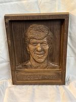 Bobby Orr bust plaque showing front facial detail and name plaque, wood grain resin