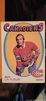 Front side of the 1971-72 Guy Lafleur OPC rookie card showing him in Canadiens uniform with bold 'Canadiens' text and team logo.