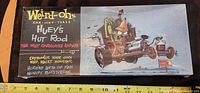 Photo showing the front top of the Weird-Oh's Huey's Hut Rod model kit box with the hot rod cartoon artwork and custom car theme text