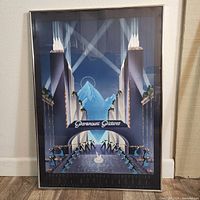 Full view of the framed art print showing the stylized Paramount mountain and dancers on steps in an art deco setting.