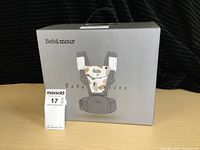 Box front showing Beba Mourad branding and image of the baby carrier.