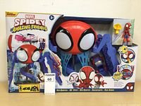 Front view of Marvel Spidey Amazing Friends Spider-Man playset in original box with figure and vehicle