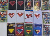 Full layout view of multiple Superman comics including Death and Return storylines, all bagged and boarded, arranged in rows showing covers and Superman logos.