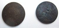 Both coins shown from reverse sides, one clear with date and wreath, one heavily worn and corroded