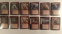 All fourteen red-border LOTR TCG cards laid out in two rows